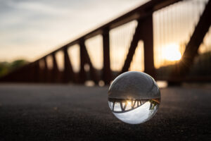 Lens ball on a bridge at sunset in Montgomery, Alabama.