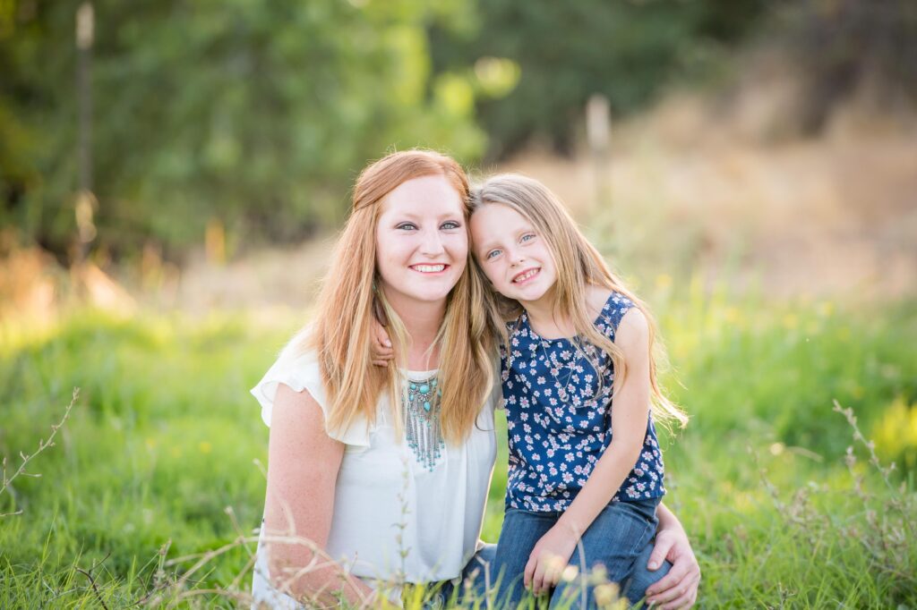 Mom and daughter in a field