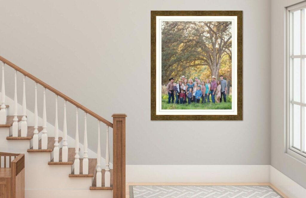 Staircase with portrait hanging on wall near the bottom