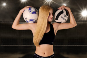 Senior dual sport with soccer and volleyball in front of stadium lights