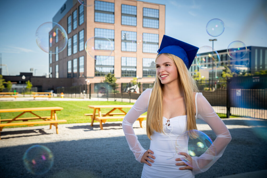 Senior session downtown Omaha with bubbles