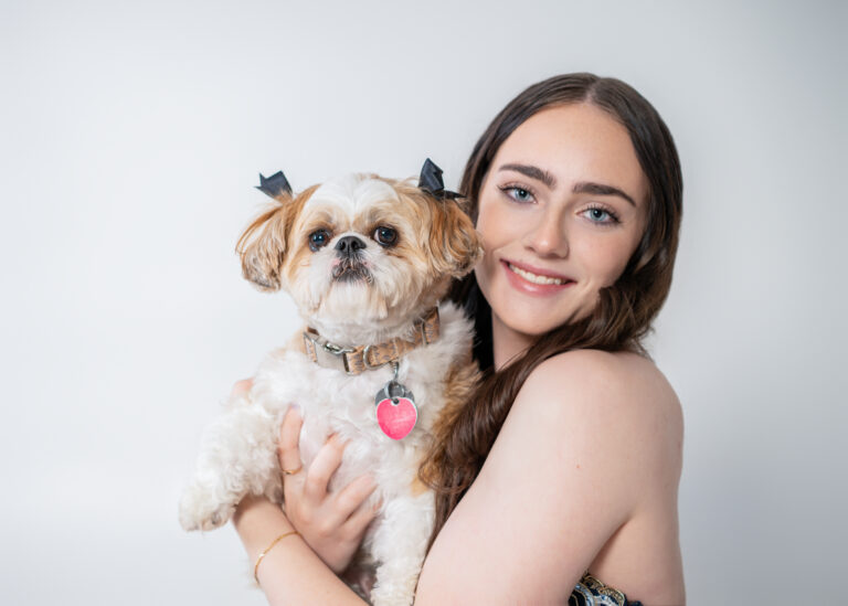 High school senior with her dog in studio