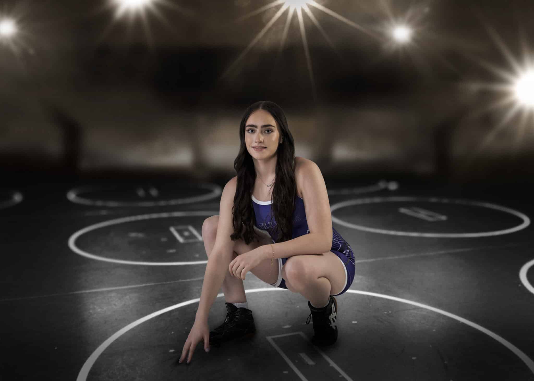 Female wrestler high school senior composite on the mats